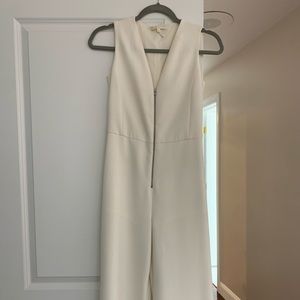 Maje boot cut white jumpsuit with zipper in the front